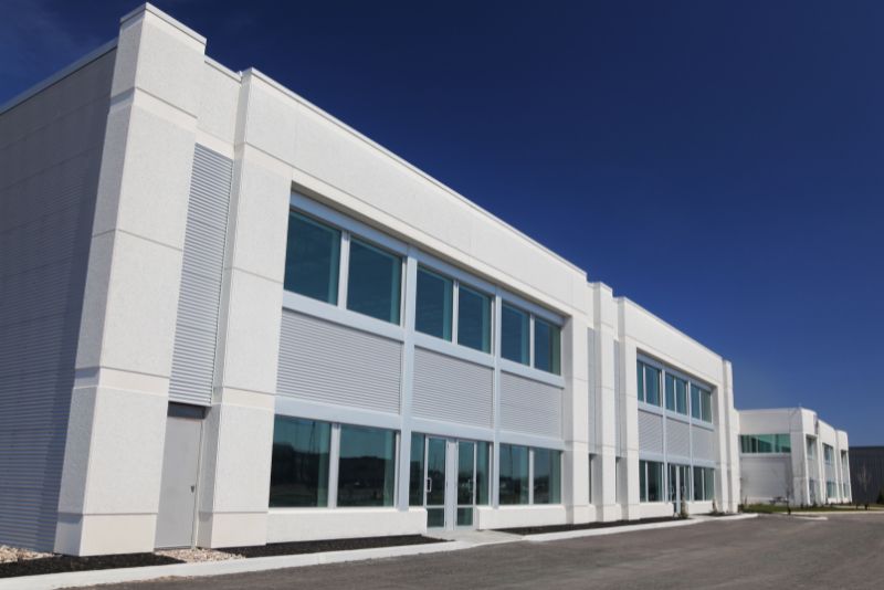 Exterior of a commercial building with a concrete forecourt