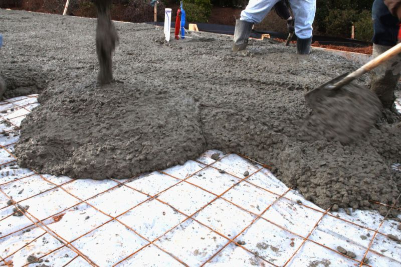 Concrete being poured and spread out during a Rockhampton concreting job