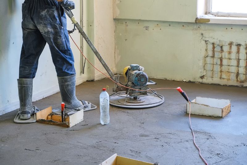 Concreter installing a new concrete floor slab