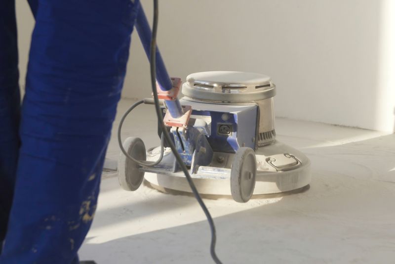 Concrete grinding machine polishing a floor surface